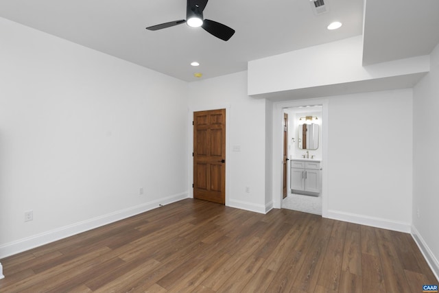 329 Carrsbrook Dr, Charlottesville, VA 22901 - unfurnished bedroom featuring wood finished floors, baseboards, recessed lighting, ensuite bathroom, and a sink