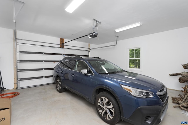 329 Carrsbrook Dr, Charlottesville, VA 22901 - garage featuring a garage door opener
