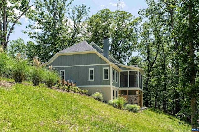 329 Carrsbrook Dr, Charlottesville, VA 22901 - view of side of property featuring a sunroom, a chimney, and a yard