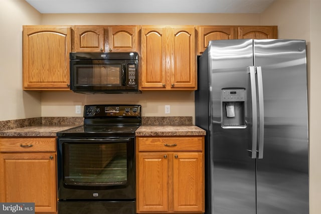 1389 Chami Dr Unit 171, Spring Grove, PA 17362 - kitchen with black appliances and dark countertops