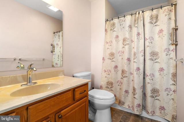 1389 Chami Dr Unit 171, Spring Grove, PA 17362 - full bath with vanity, toilet, stone finish flooring, and a shower with curtain