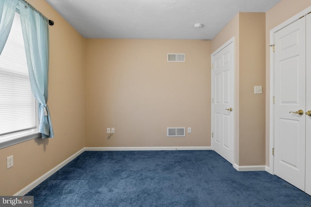1389 Chami Dr Unit 171, Spring Grove, PA 17362 - carpeted empty room featuring baseboards and a smoke detector