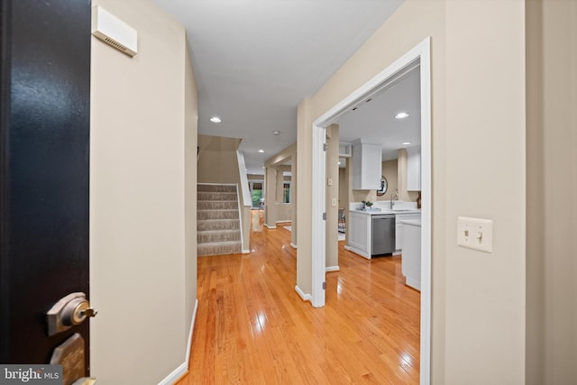 2300 Yvonnes Way, Dunn Loring, VA 22027 - corridor with light wood finished floors, stairway, a sink, baseboards, and recessed lighting
