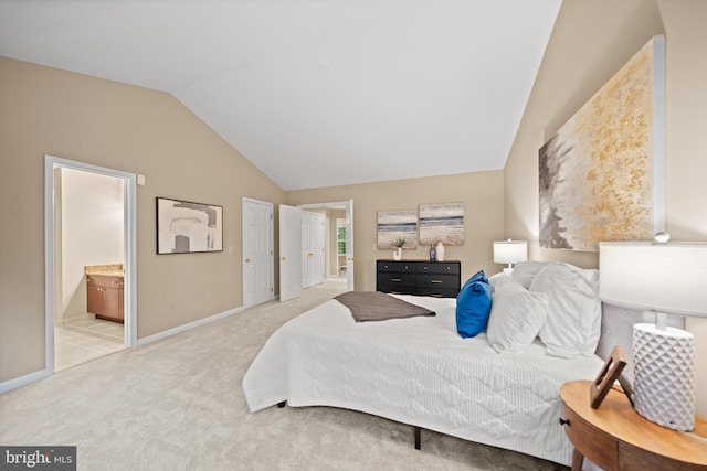 2300 Yvonnes Way, Dunn Loring, VA 22027 - bedroom with vaulted ceiling, light carpet, baseboards, and connected bathroom