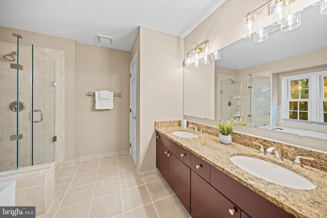 2300 Yvonnes Way, Dunn Loring, VA 22027 - full bathroom featuring a stall shower, double vanity, tile patterned floors, and baseboards
