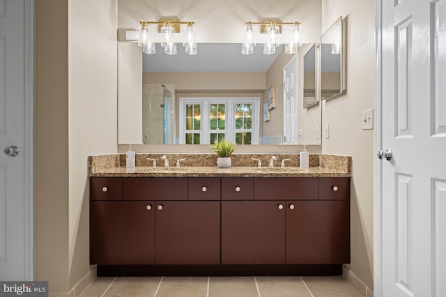 2300 Yvonnes Way, Dunn Loring, VA 22027 - full bath featuring double vanity, baseboards, a tile shower, and tile patterned floors
