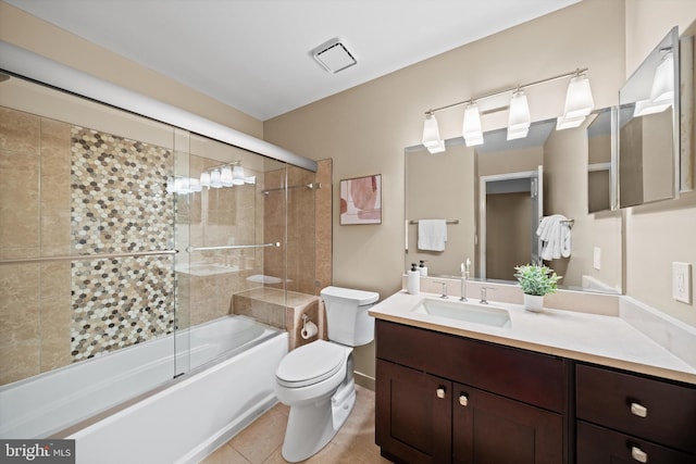2300 Yvonnes Way, Dunn Loring, VA 22027 - bathroom featuring vanity, toilet, shower / bath combination with glass door, tile patterned floors, and baseboards