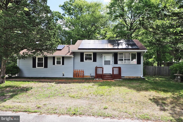 827 Rogers St, Lanoka Harbor, NJ 08734 - view of front of home with roof mounted solar panels