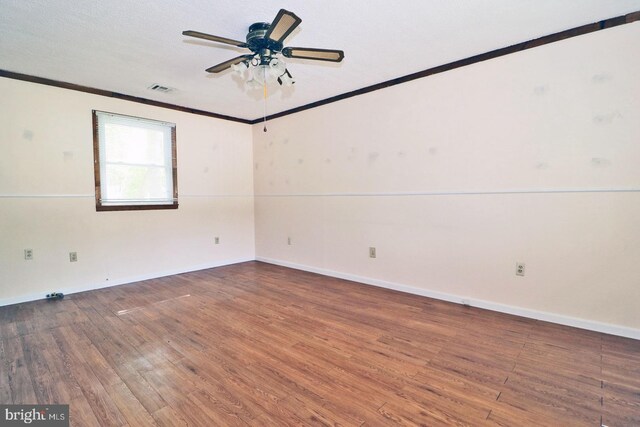 827 Rogers St, Lanoka Harbor, NJ 08734 - empty room with ornamental molding, wood finished floors, ceiling fan, and baseboards