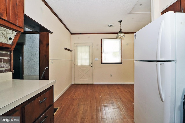 827 Rogers St, Lanoka Harbor, NJ 08734 - kitchen featuring freestanding refrigerator, hardwood / wood-style floors, baseboards, light countertops, and ornamental molding