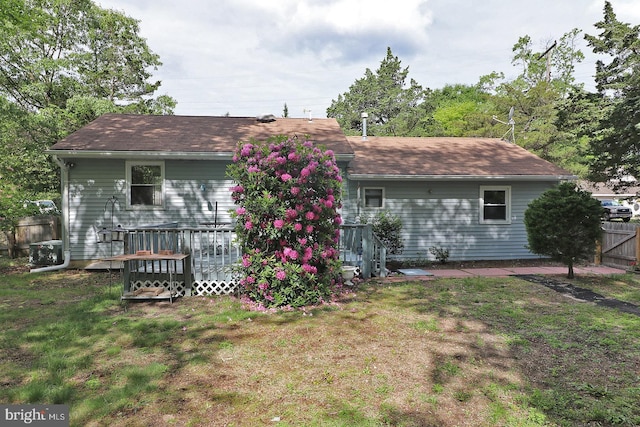827 Rogers St, Lanoka Harbor, NJ 08734 - rear view of house with a wooden deck and central air condition unit