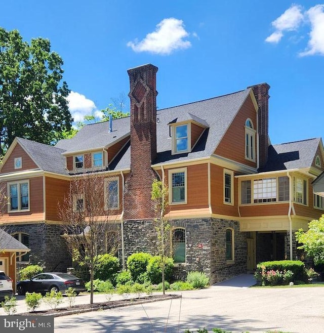 206 Price Ave Unit 2, Narberth, PA 19072 - view of front of property with a chimney and stone siding