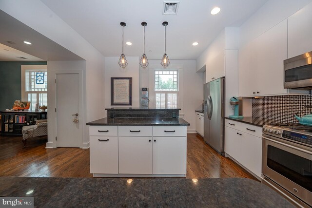 206 Price Ave Unit 2, Narberth, PA 19072 - kitchen featuring appliances with stainless steel finishes, dark wood-style floors, plenty of natural light, white cabinetry, and recessed lighting
