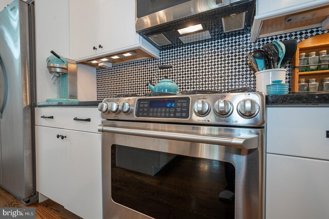 206 Price Ave Unit 2, Narberth, PA 19072 - kitchen view of appliances with stainless steel finishes, white cabinets, and tasteful backsplash