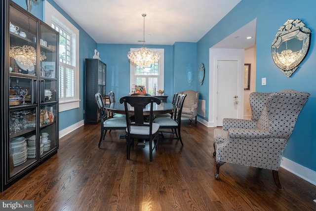 206 Price Ave Unit 2, Narberth, PA 19072 - dining space with a chandelier, baseboards, and dark wood finished floors