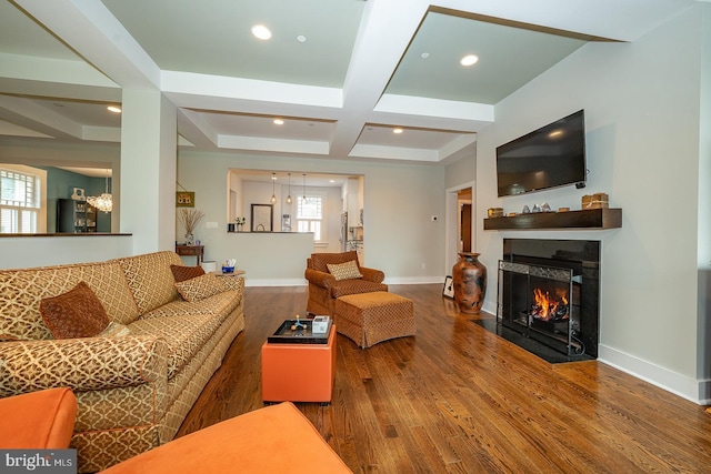 206 Price Ave Unit 2, Narberth, PA 19072 - living room featuring wood finished floors, coffered ceiling, a fireplace with flush hearth, baseboards, and beam ceiling