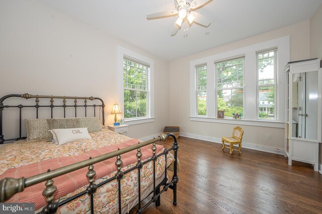 206 Price Ave Unit 2, Narberth, PA 19072 - bedroom featuring multiple windows, wood finished floors, and baseboards