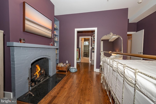 206 Price Ave Unit 2, Narberth, PA 19072 - living area with wood finished floors and a brick fireplace
