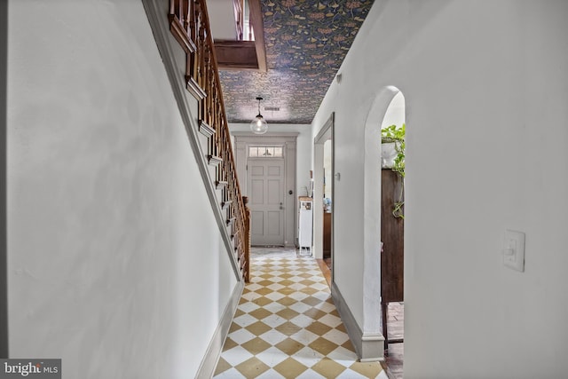 101 Warren Ave, Sewell, NJ 08080 - hall featuring light floors, arched walkways, and stairway