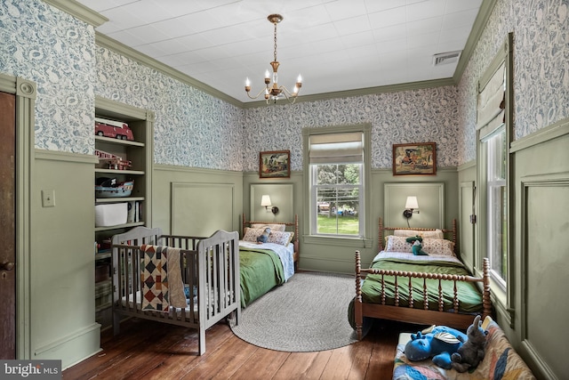 101 Warren Ave, Sewell, NJ 08080 - bedroom with a chandelier, ornamental molding, hardwood / wood-style floors, a wainscoted wall, and wallpapered walls