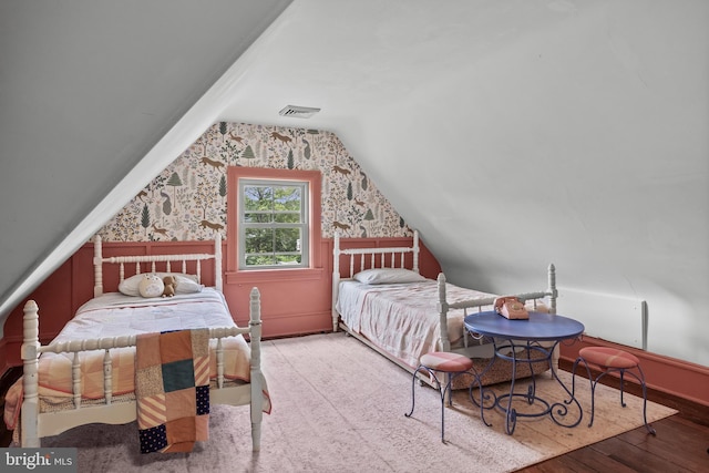 101 Warren Ave, Sewell, NJ 08080 - bedroom featuring wallpapered walls, hardwood / wood-style floors, and lofted ceiling