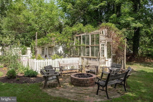 101 Warren Ave, Sewell, NJ 08080 - view of patio / terrace featuring an outdoor fire pit and a greenhouse