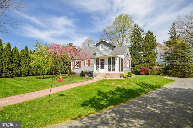 518 S Glenwood St, Allentown, PA 18104 - view of front of home featuring a front yard, entry steps, and roof with shingles