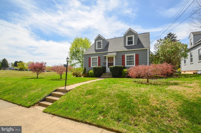 518 S Glenwood St, Allentown, PA 18104 - cape cod home featuring a front lawn and roof with shingles