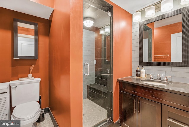 1522 Race St Unit 1, Philadelphia, PA 19102 - full bathroom with toilet, a stall shower, vanity, and backsplash