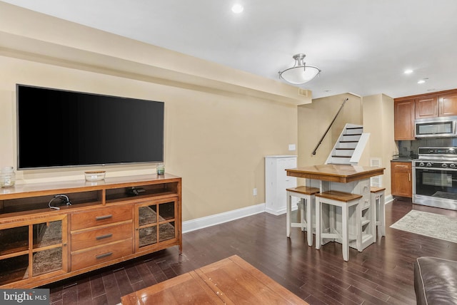 1522 Race St Unit 1, Philadelphia, PA 19102 - living room featuring stairway, dark wood-type flooring, recessed lighting, and baseboards