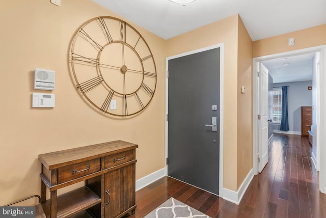 1522 Race St Unit 1, Philadelphia, PA 19102 - corridor with dark wood-style flooring and baseboards
