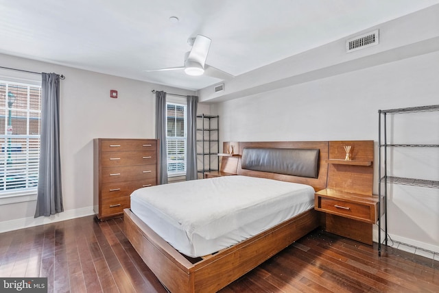 1522 Race St Unit 1, Philadelphia, PA 19102 - bedroom with dark wood finished floors, baseboards, multiple windows, and a ceiling fan
