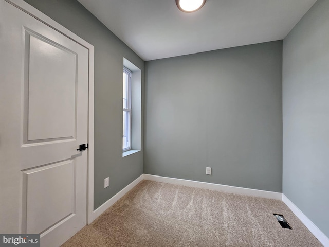 6022 N Lambert St, Philadelphia, PA 19138 - carpeted empty room with baseboards