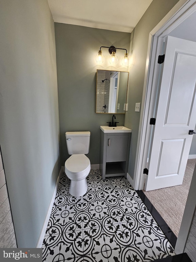 6022 N Lambert St, Philadelphia, PA 19138 - bathroom with toilet, vanity, baseboards, and tile patterned flooring