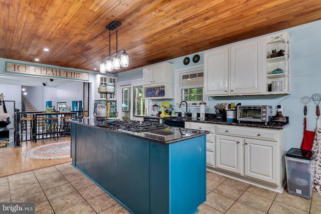 7001 Locust Ct, Owings, MD 20736 - kitchen with wood ceiling, open shelves, white cabinetry, gas cooktop, and a sink