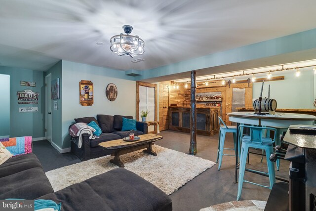 7001 Locust Ct, Owings, MD 20736 - living area featuring track lighting and a fireplace