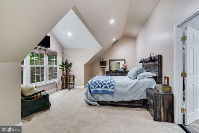 7001 Locust Ct, Owings, MD 20736 - bedroom featuring carpet, lofted ceiling, and baseboards
