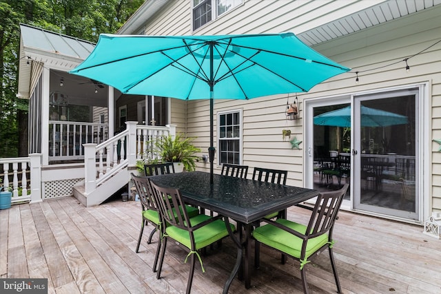 7001 Locust Ct, Owings, MD 20736 - wooden deck featuring outdoor dining area
