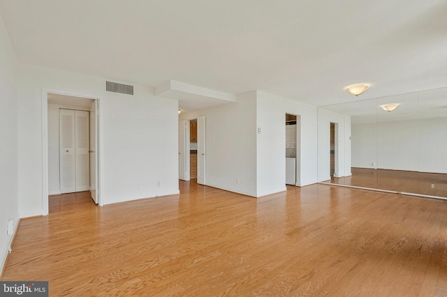 6800 Fleetwood Rd Unit 1219, Mclean, VA 22101 - empty room featuring light wood-style floors and baseboards