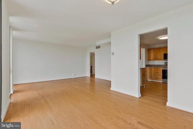 6800 Fleetwood Rd Unit 1219, Mclean, VA 22101 - empty room featuring light wood finished floors and baseboards