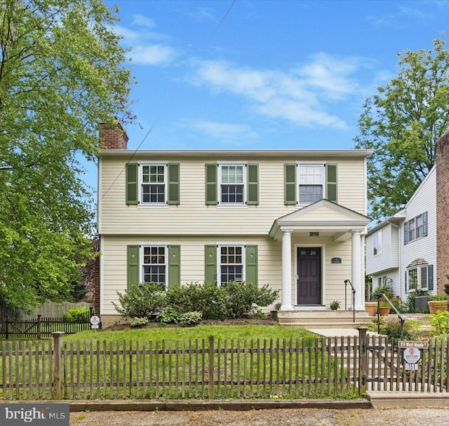 151 W Meade St, Philadelphia, PA 19118 - colonial inspired home featuring a chimney