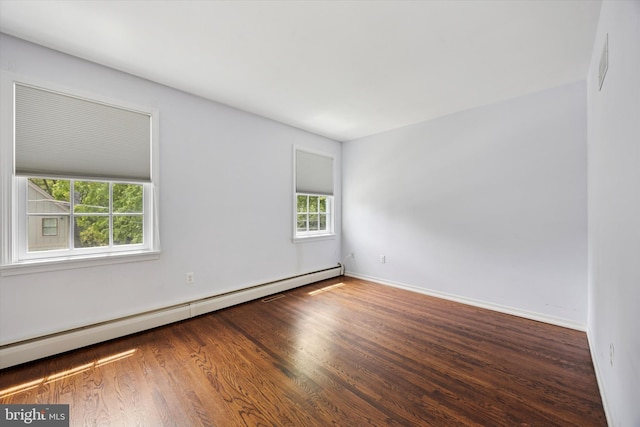 151 W Meade St, Philadelphia, PA 19118 - unfurnished room with baseboard heating, wood finished floors, and baseboards