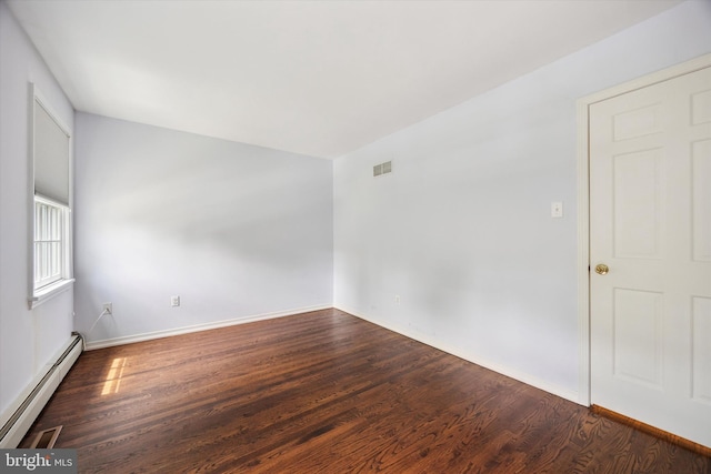 151 W Meade St, Philadelphia, PA 19118 - empty room with baseboard heating, wood finished floors, and baseboards
