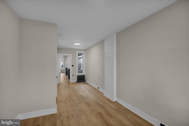 1120 N 10th St, Reading, PA 19604 - corridor featuring baseboards and light wood-style floors