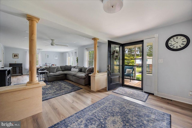 209 Burlington Ave, Voorhees, NJ 08043 - entryway featuring decorative columns, wood finished floors, a ceiling fan, and baseboards
