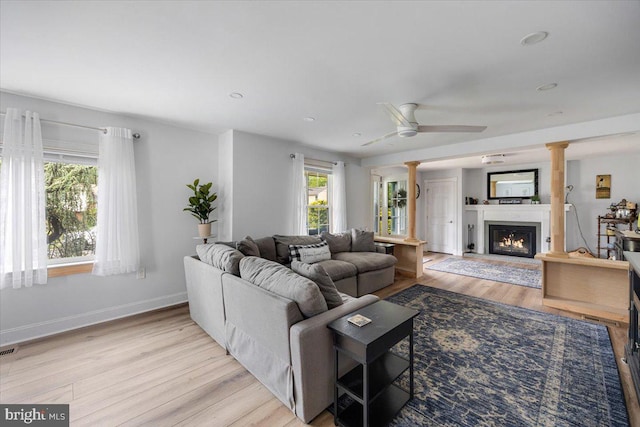 209 Burlington Ave, Voorhees, NJ 08043 - living room featuring decorative columns, healthy amount of natural light, light wood-type flooring, and recessed lighting