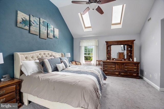 209 Burlington Ave, Voorhees, NJ 08043 - carpeted bedroom with a skylight, vaulted ceiling, a ceiling fan, and baseboards