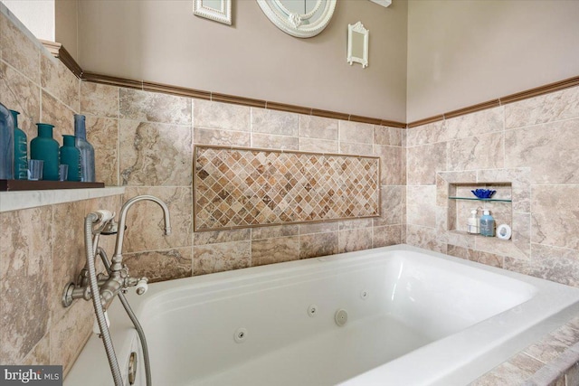 209 Burlington Ave, Voorhees, NJ 08043 - bathroom featuring a jetted tub and tile walls