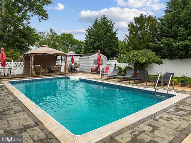 209 Burlington Ave, Voorhees, NJ 08043 - view of swimming pool with a gazebo, a fenced backyard, and a patio