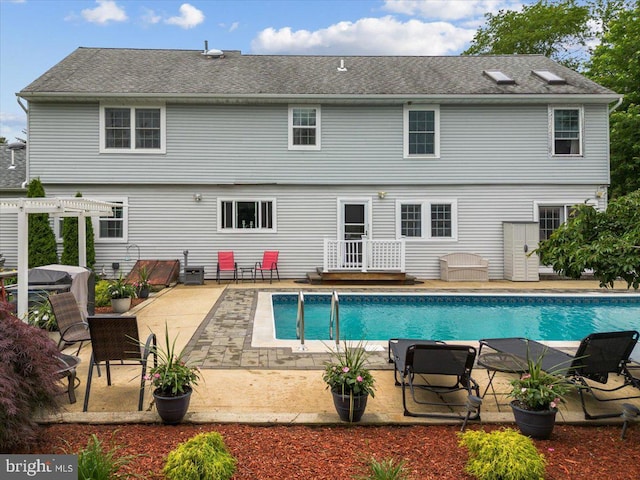 209 Burlington Ave, Voorhees, NJ 08043 - back of house with a pergola, an outdoor pool, and a patio area